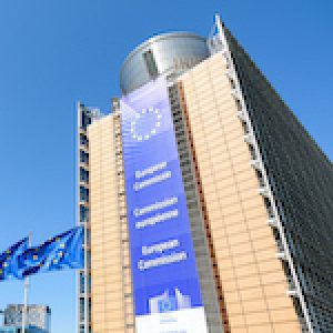 Low angle view of the large banner on the facade of the southern wing of the Berlaymont building, seat of the European Commission in Brussels, Belgium.