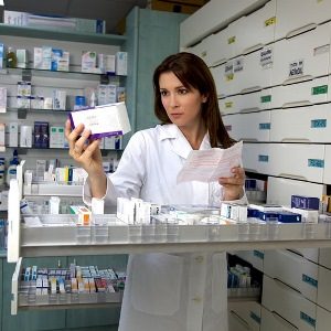 pharmacist woman looking for medicine