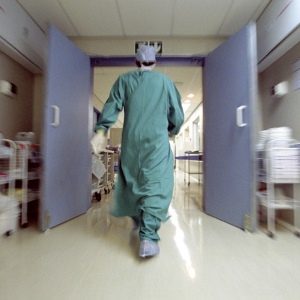 Doctor rushing in hallway