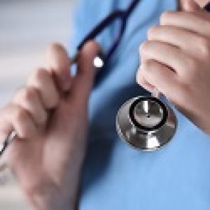 phonendoscope in doctor arm